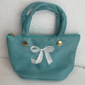 Vintage Tiffany & Co. Blue Mini Bag with White Bow. great bag for a date/makeup